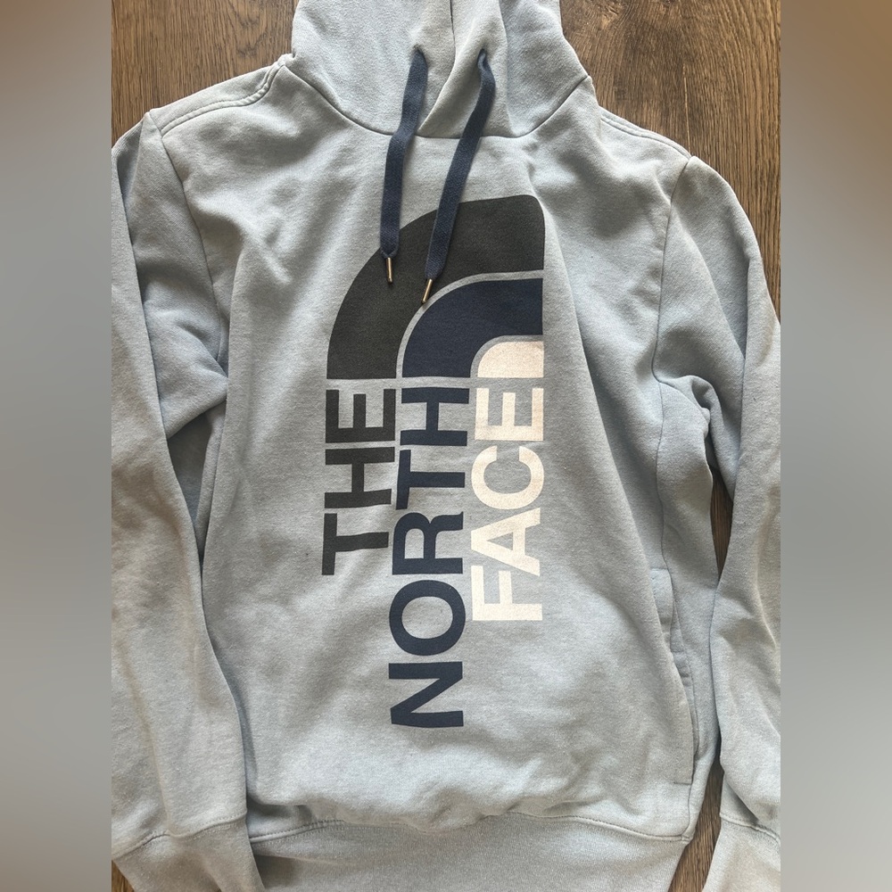 The North Face Blue Sweater with Iconic Branding